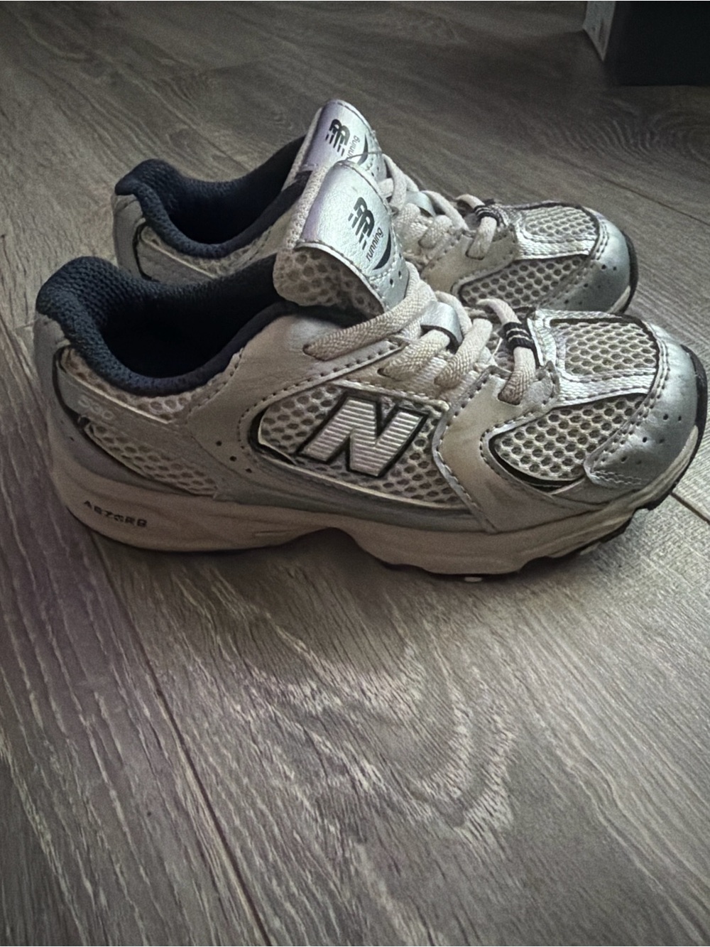 New Balance Kids Silver and Black Athletic Sneakers